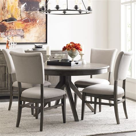 Round Dining Table and Four Chairs: A Timeless Addition to Any Home