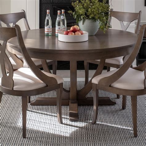 Round Table with Chairs: A Timeless Classic for Collaboration and Style