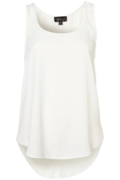 Ladies Tops White: The Quintessential Wardrobe Staple